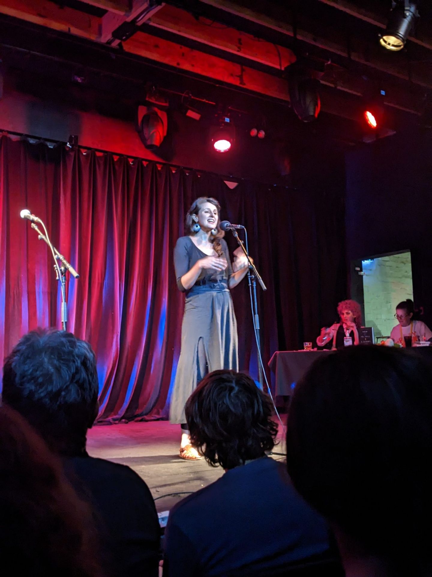 Jo on stage at The Moth storytelling event