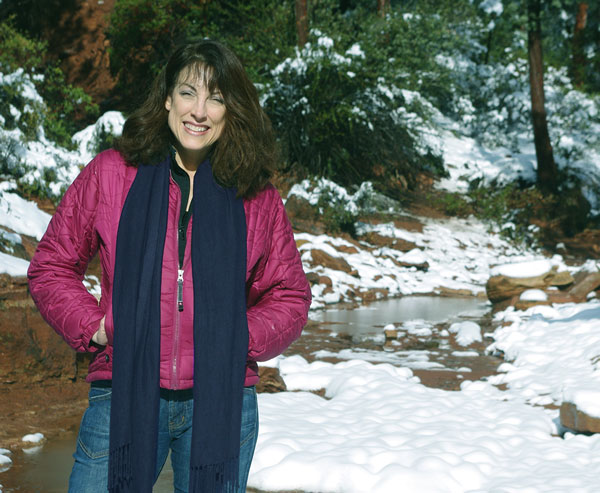 Mary standing in a snowy canyon